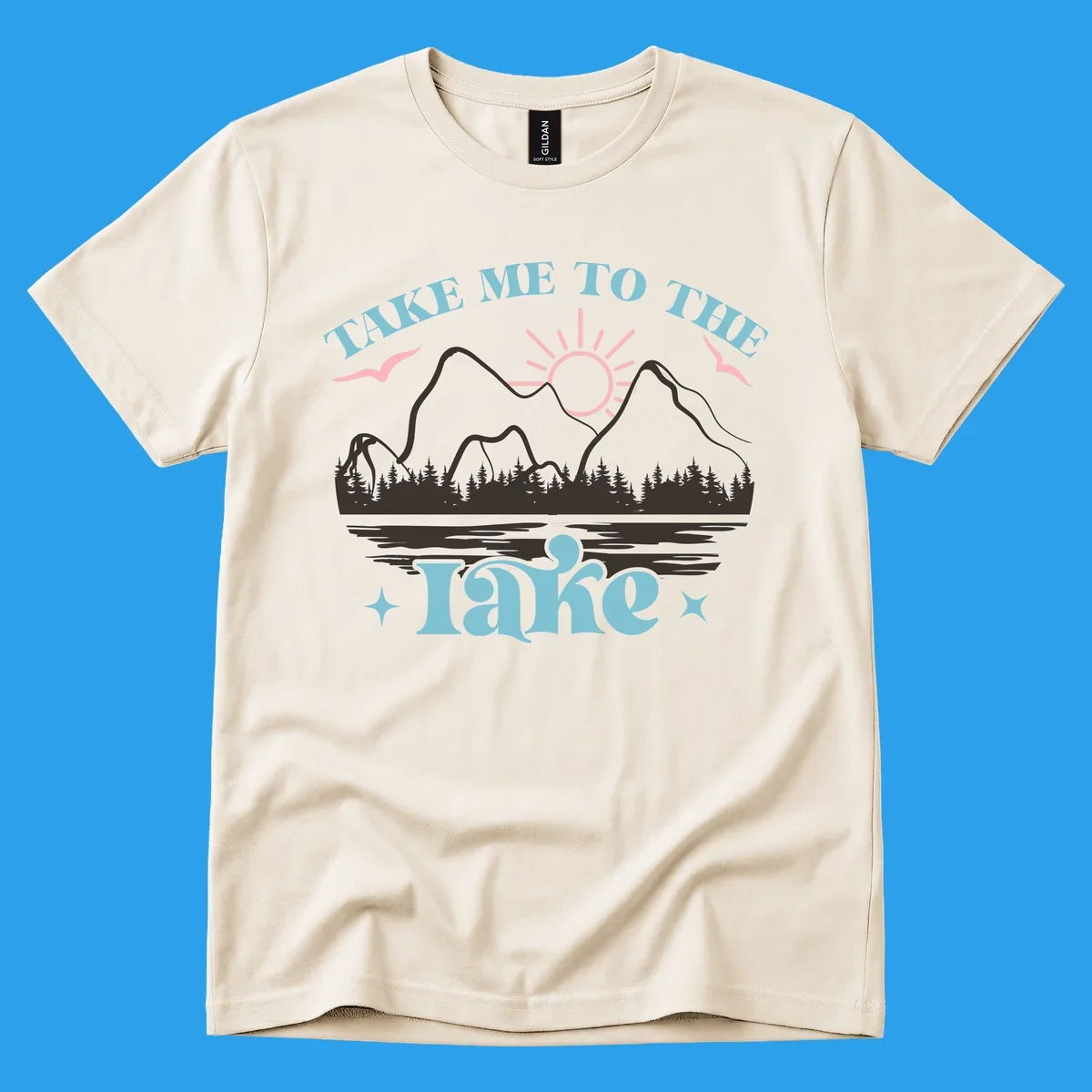 Illustration of mountains, lake, sun, and birds with text 'Take Me To The Lake'.