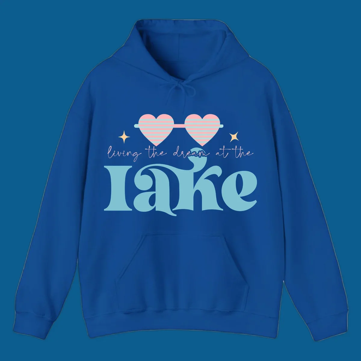 Living the dream lake life design with heart sunglasses and retro lettering.