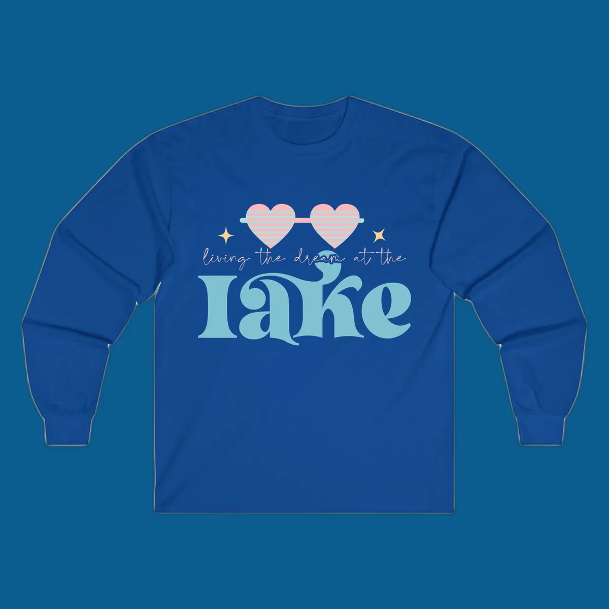 Living the dream lake life design with heart sunglasses and retro lettering.