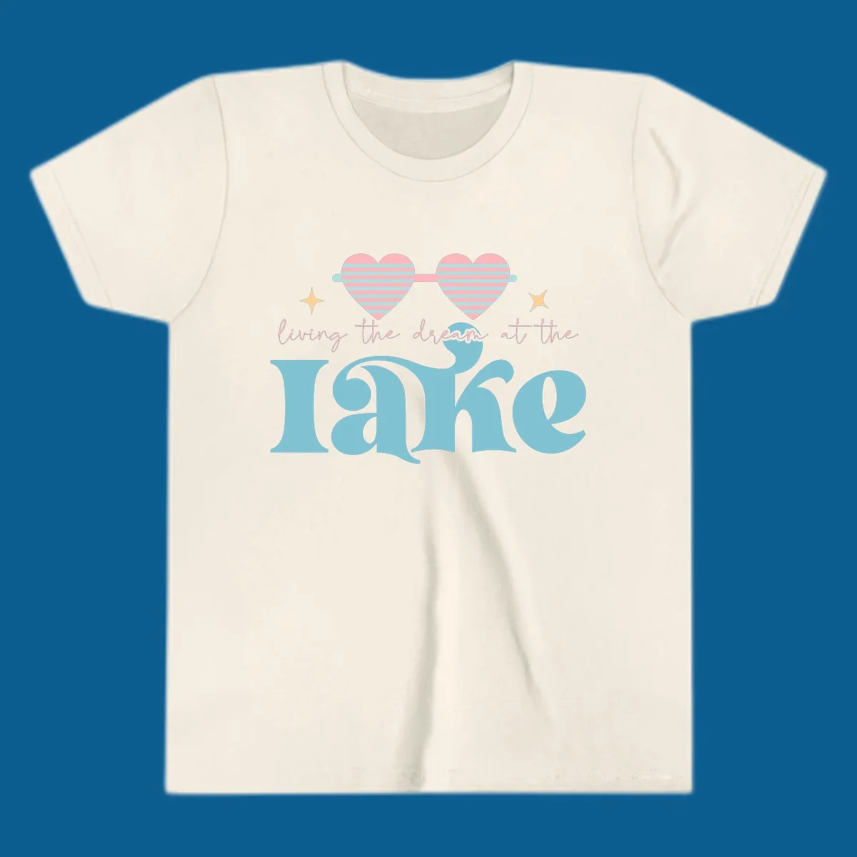 Living the dream lake life design with heart sunglasses and retro lettering.