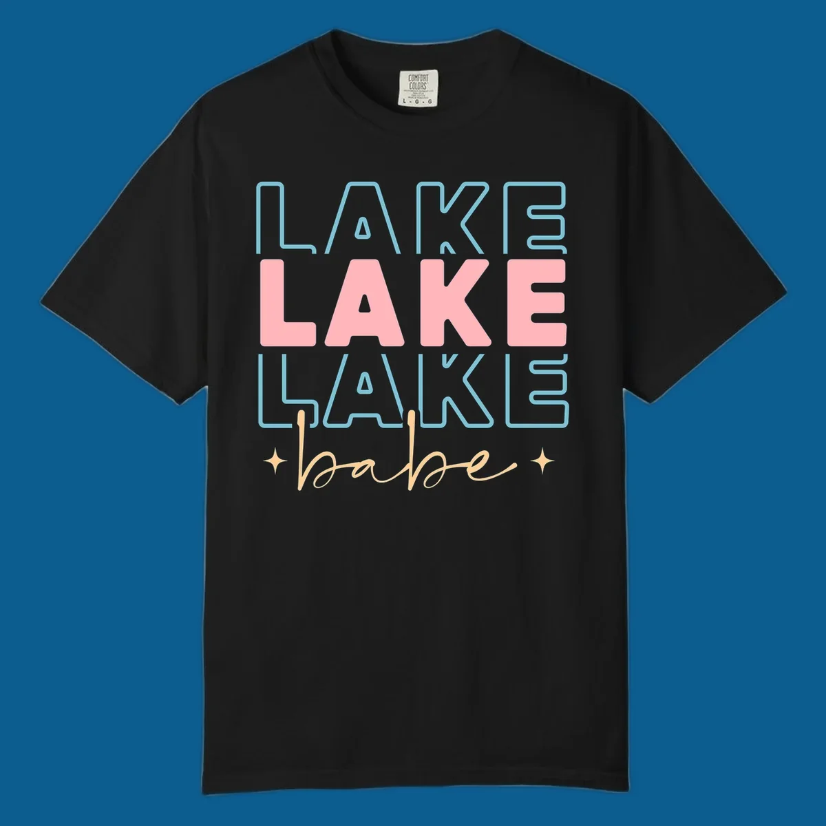 Retro typography design featuring the words LAKE LAKE LAKE and babe, with gold starburst accents.