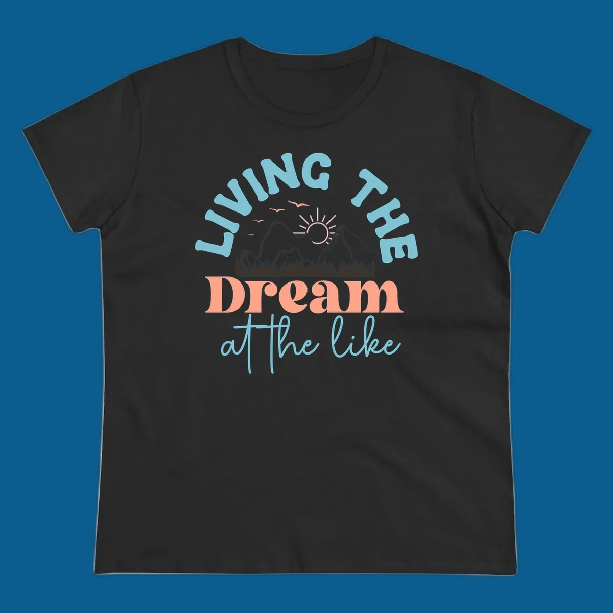 Illustration of mountains with a sunrise and birds above the text 'Living The Dream At The Like'.