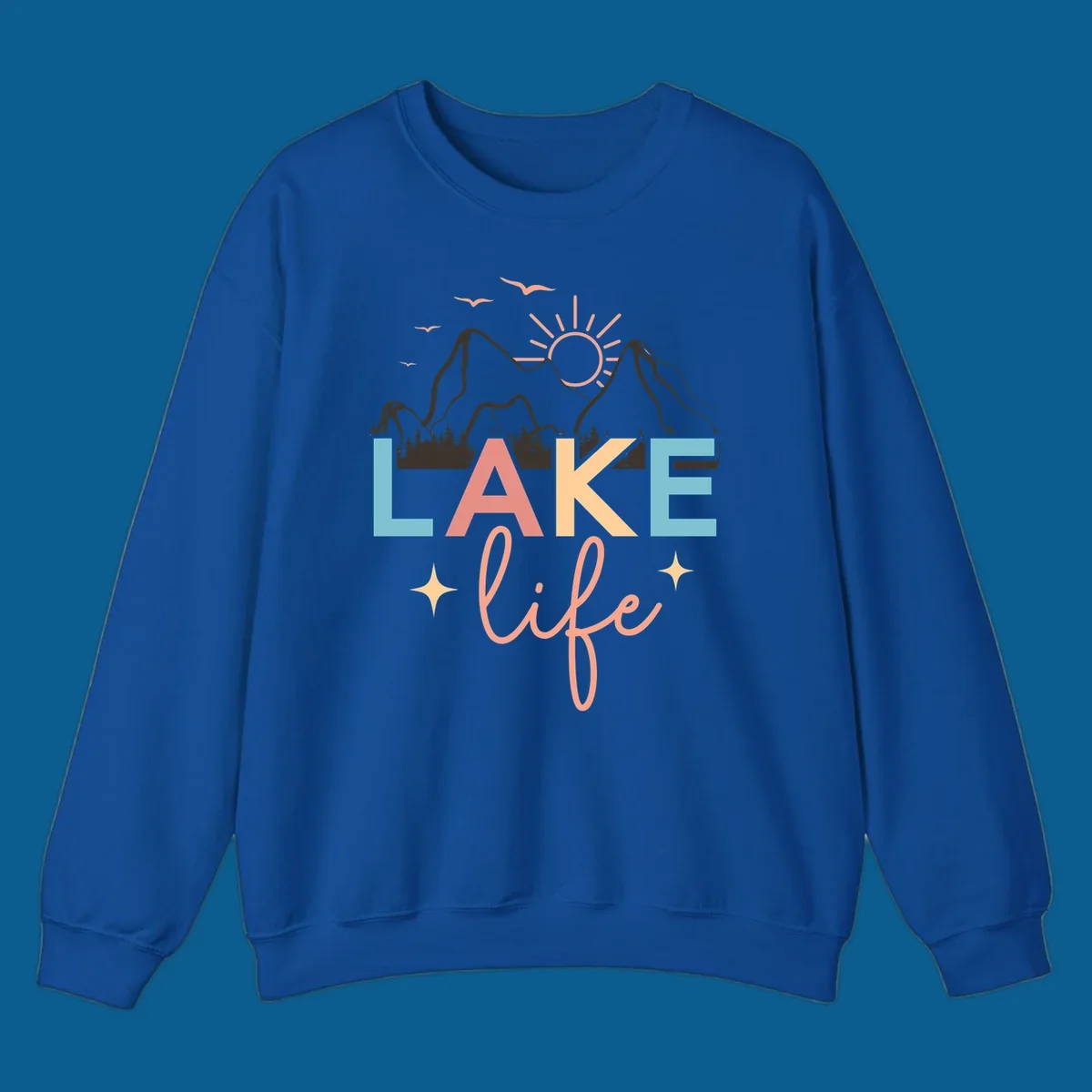 Lake life mountains graphic with colorful text and scenic background.