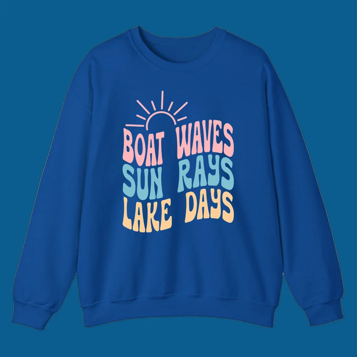 Retro text design featuring 'Boat Waves Sun Rays Lake Days' with sun rays.