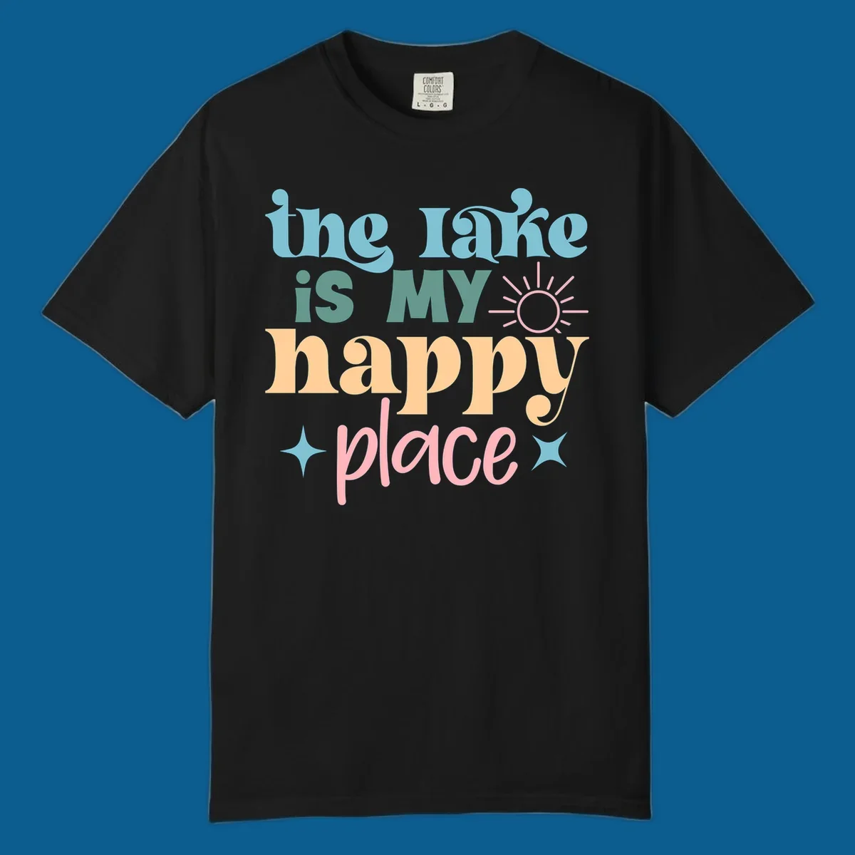 The lake is my happy place text with sun and starbursts, lake-happy-place design