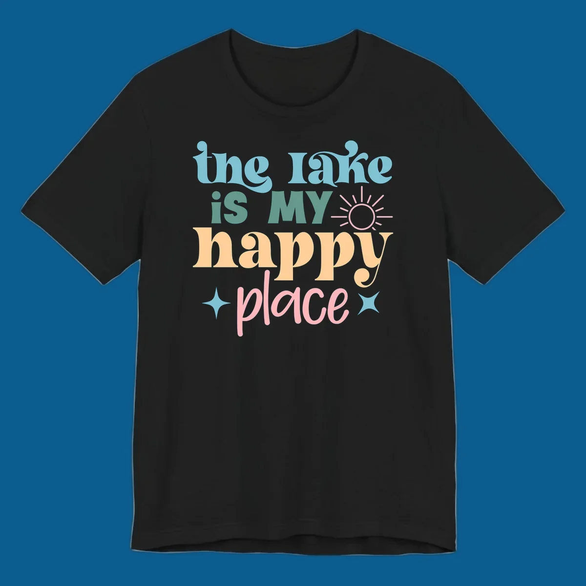 The lake is my happy place text with sun and starbursts, lake-happy-place design