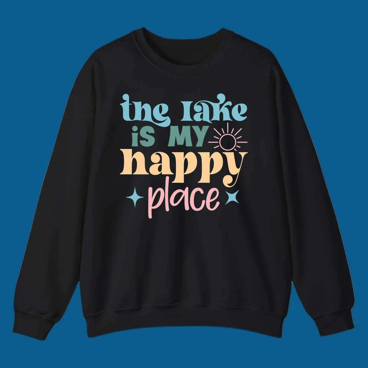 The lake is my happy place text with sun and starbursts, lake-happy-place design