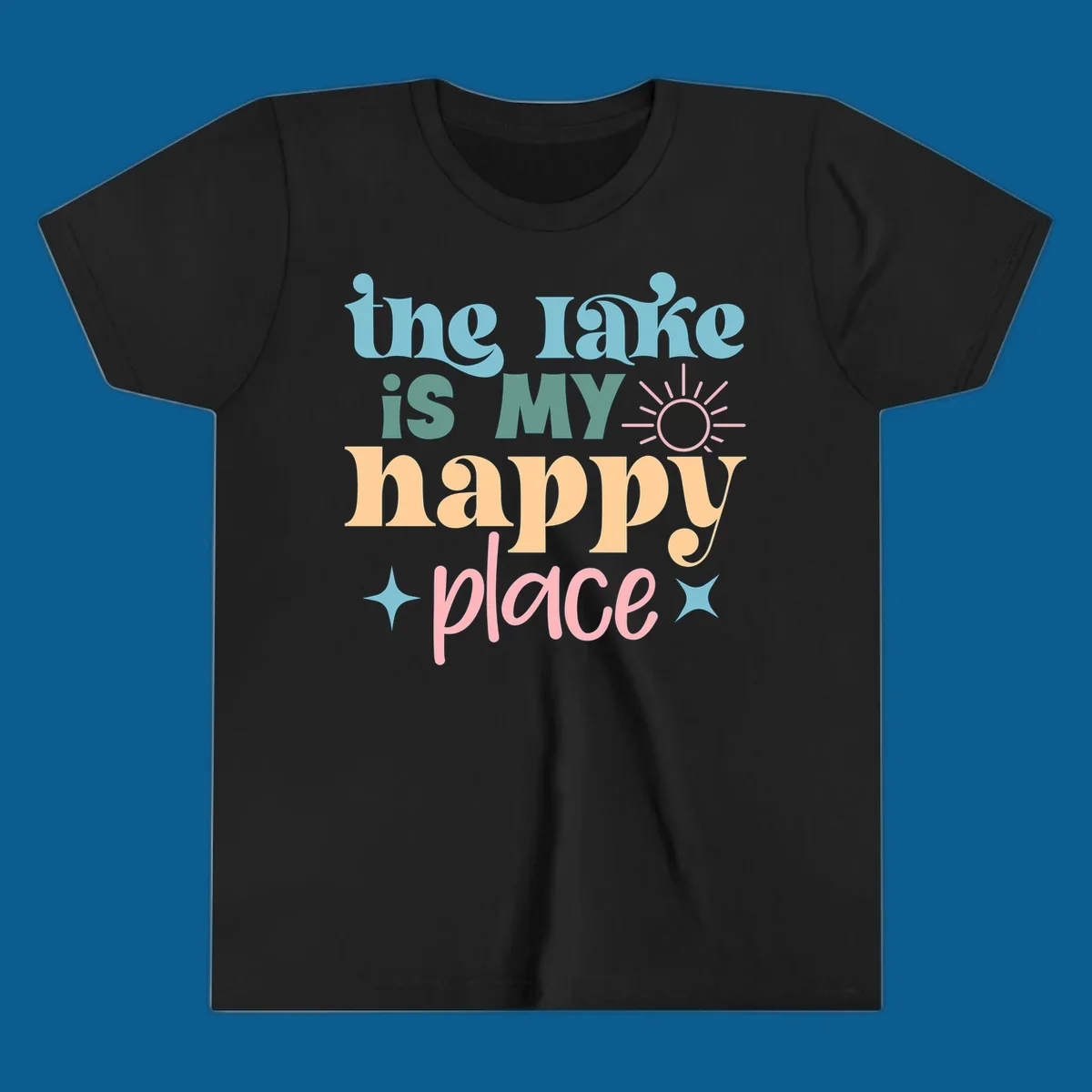 The lake is my happy place text with sun and starbursts, lake-happy-place design