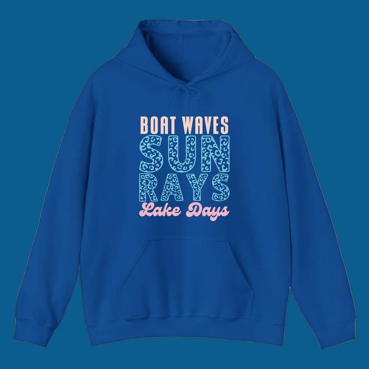 Boat waves sun rays lake days text design with pink and teal leopard print.