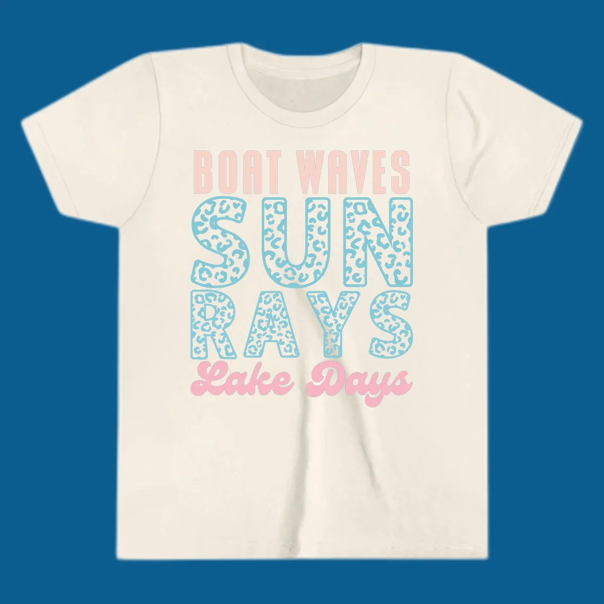Boat waves sun rays lake days text design with pink and teal leopard print.