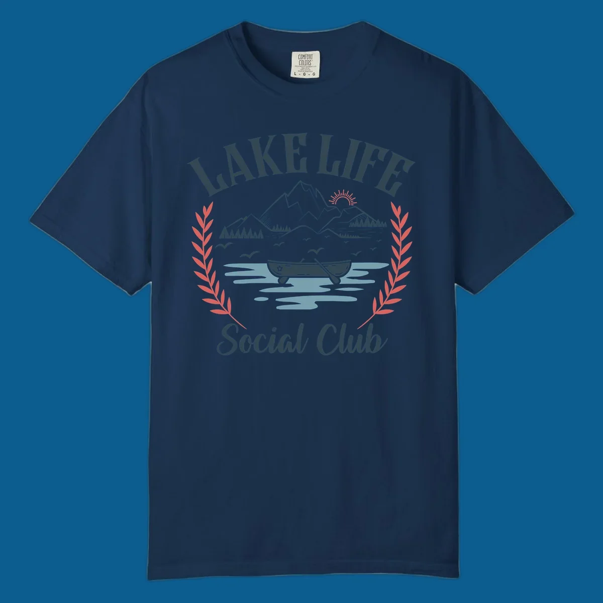 Lake life social club design with mountains, lake, canoe, and birds.