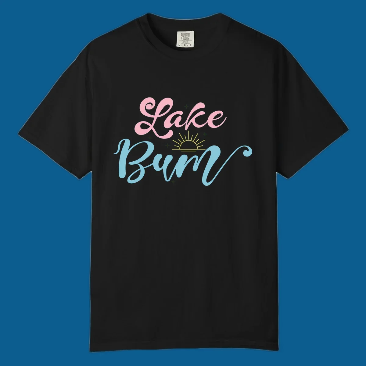 Lake Bum text design with a sunset graphic, in pink and blue script.
