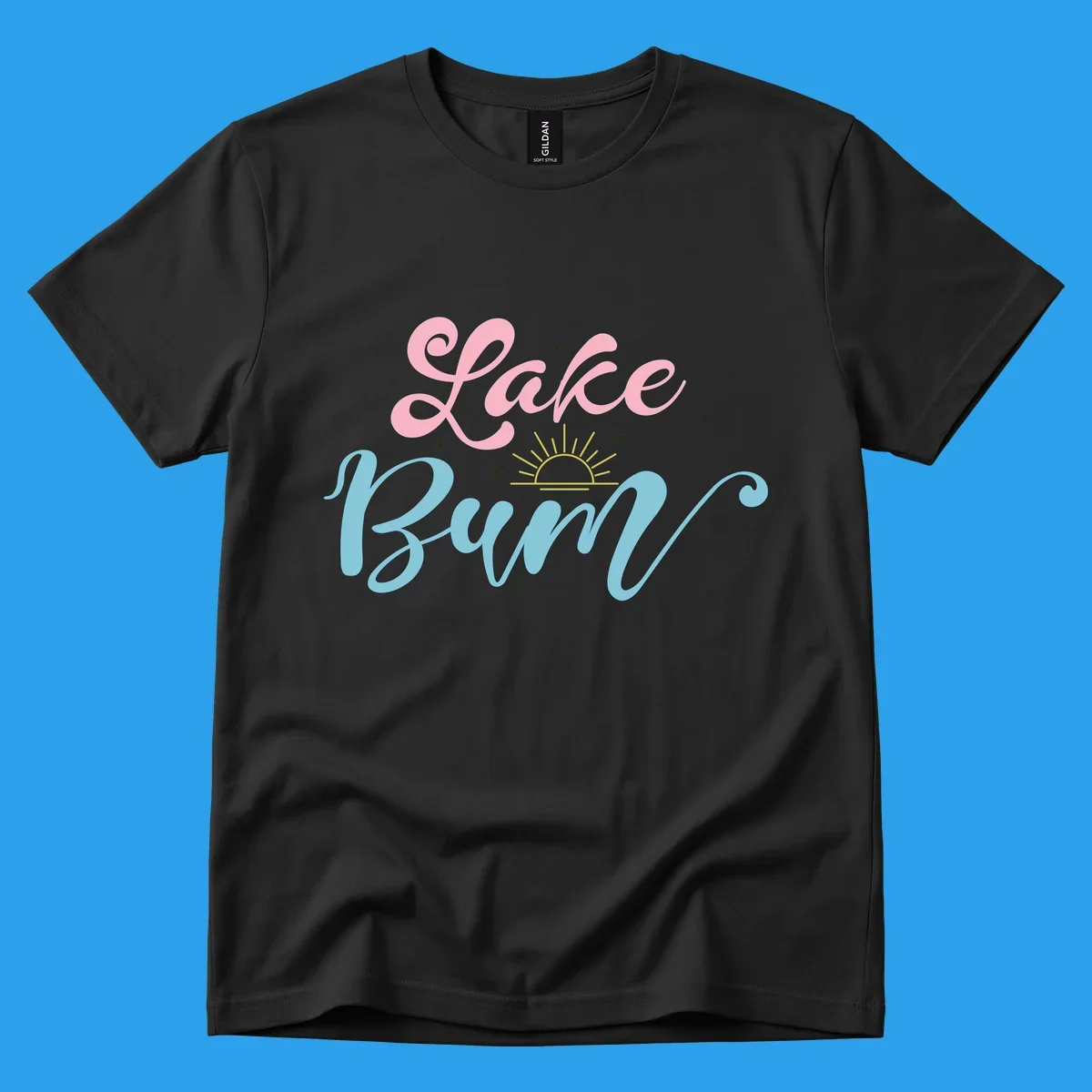 Lake Bum text design with a sunset graphic, in pink and blue script.