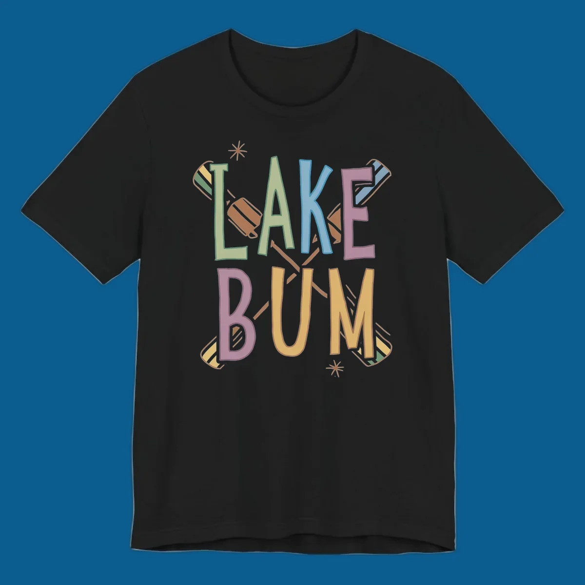 Lake Bum text with crossed oars and starbursts in colorful hand-drawn lettering.