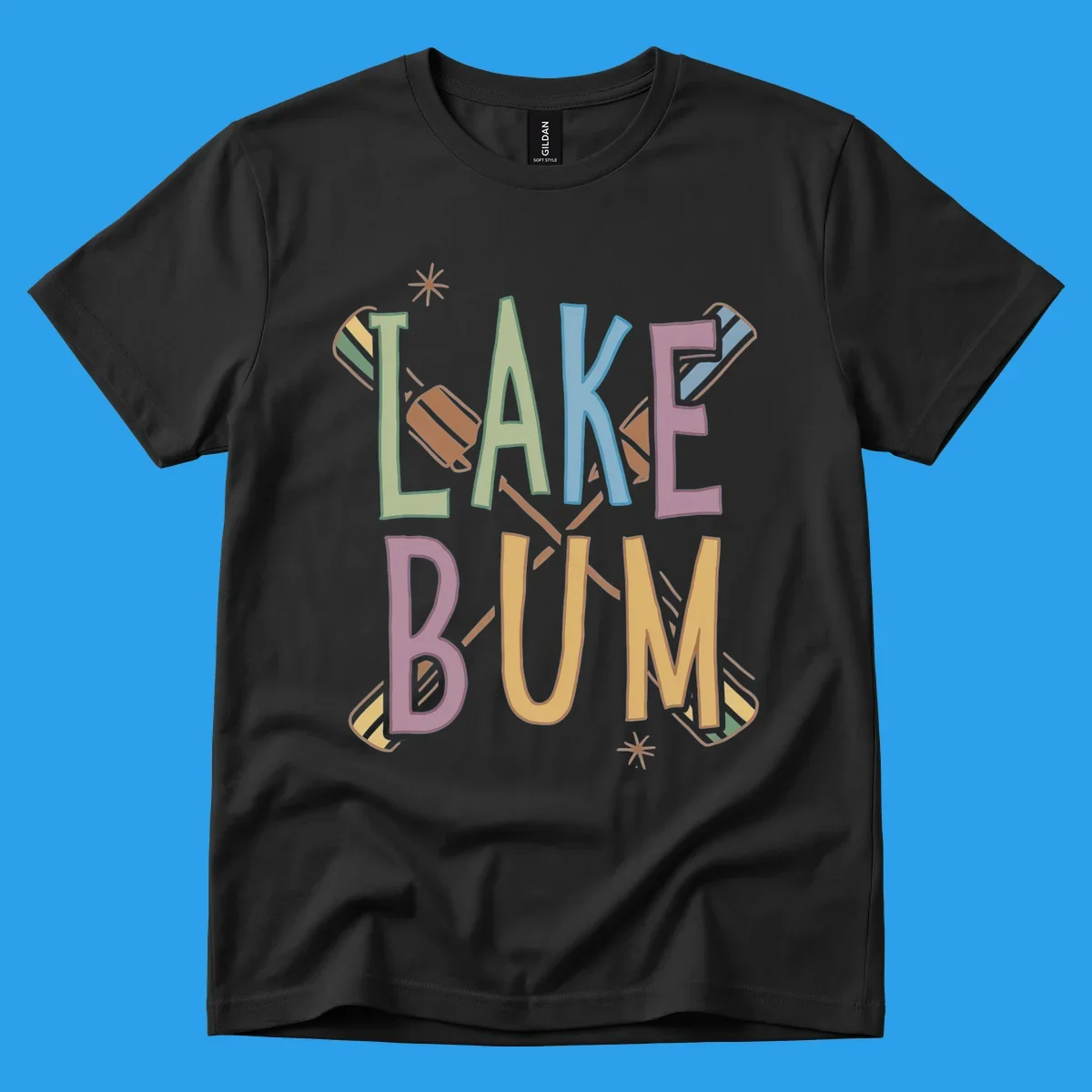 Lake Bum text with crossed oars and starbursts in colorful hand-drawn lettering.