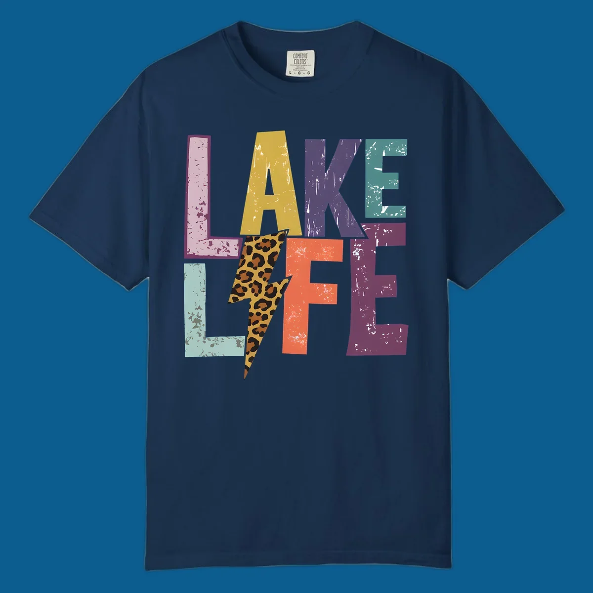 Distressed letters spelling LAKE LIFE with a leopard print lightning bolt, lake-life-style.