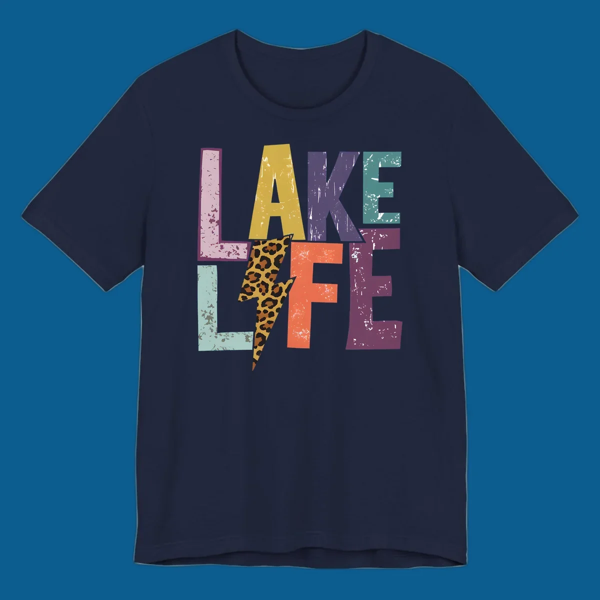 Distressed letters spelling LAKE LIFE with a leopard print lightning bolt, lake-life-style.