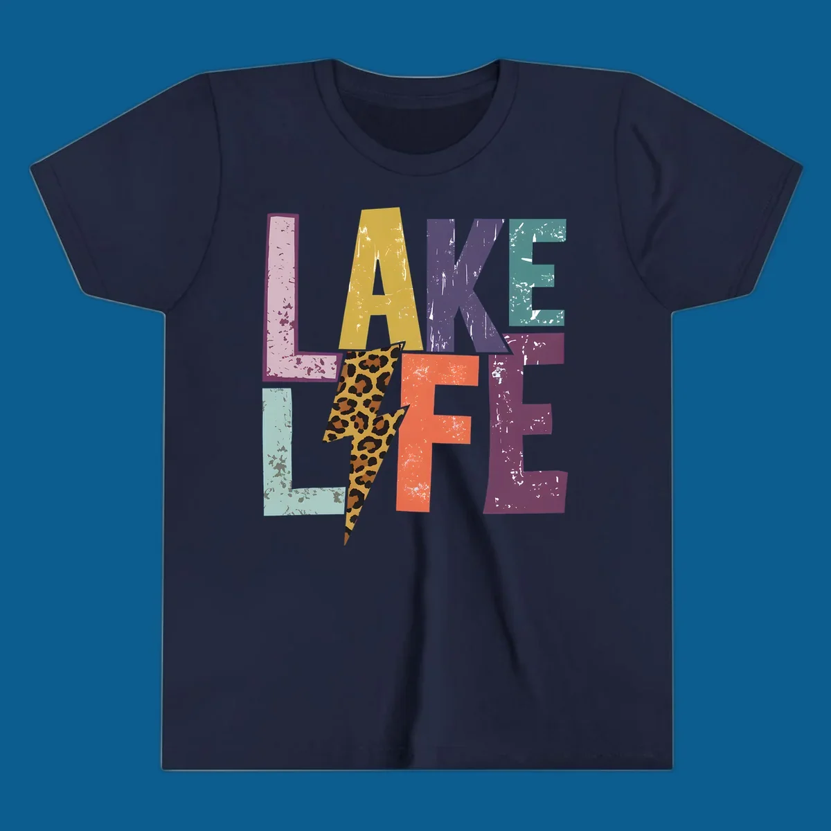Distressed letters spelling LAKE LIFE with a leopard print lightning bolt, lake-life-style.
