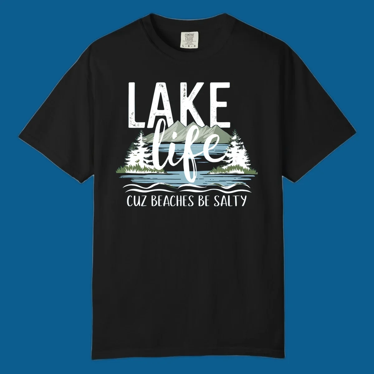 Lake life text with mountains, trees, and water; cuz beaches be salty. Lake-life-salty design.