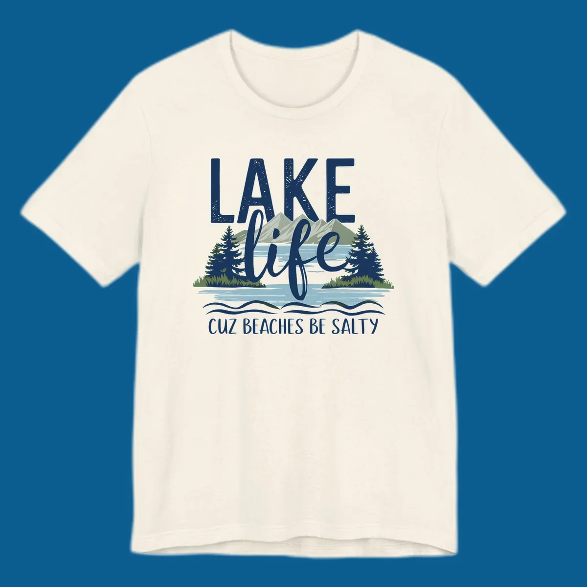 Lake life text with mountains, trees, and water; cuz beaches be salty. Lake-life-salty design.