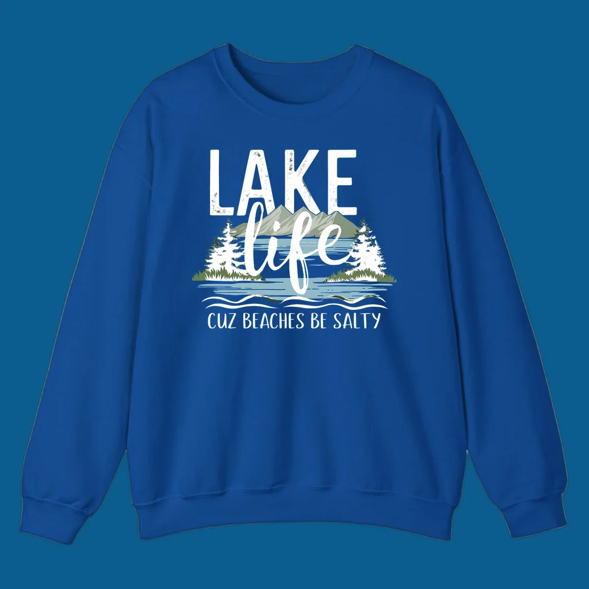 Lake life text with mountains, trees, and water; cuz beaches be salty. Lake-life-salty design.