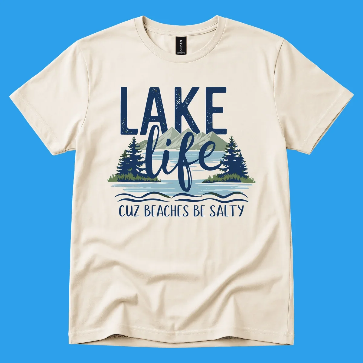 Lake life text with mountains, trees, and water; cuz beaches be salty. Lake-life-salty design.