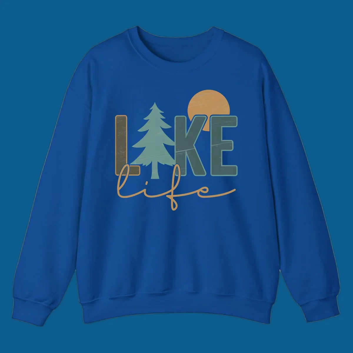 Retro lake life design with text, pine tree, and sun.