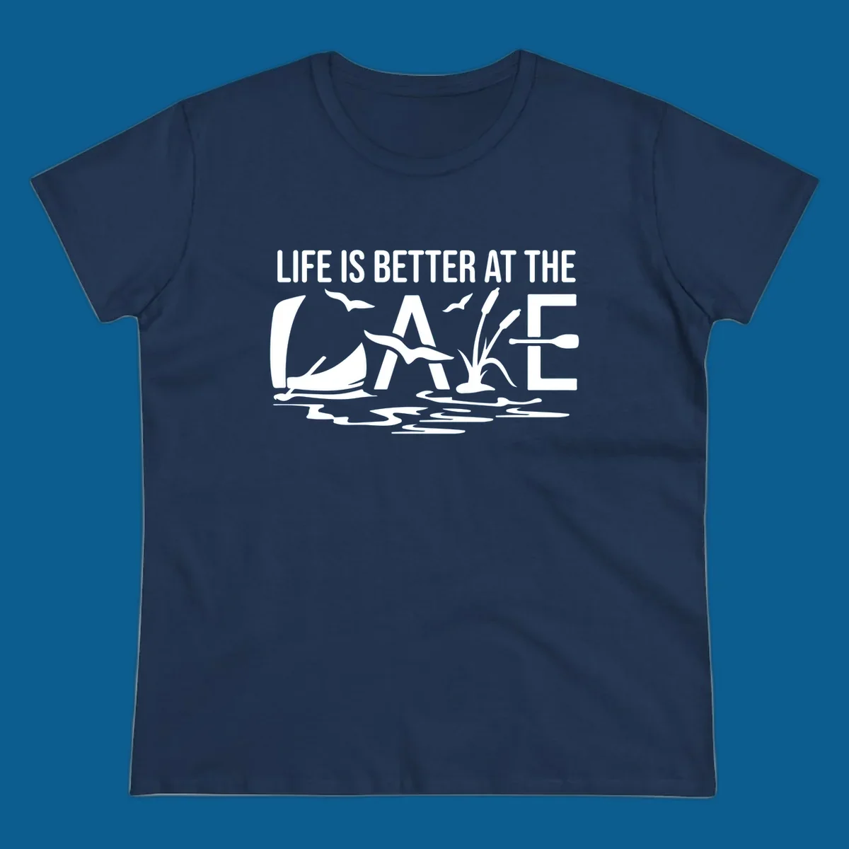 Life Is Better At The Lake design with sailboat, birds, reeds, paddle, and text.