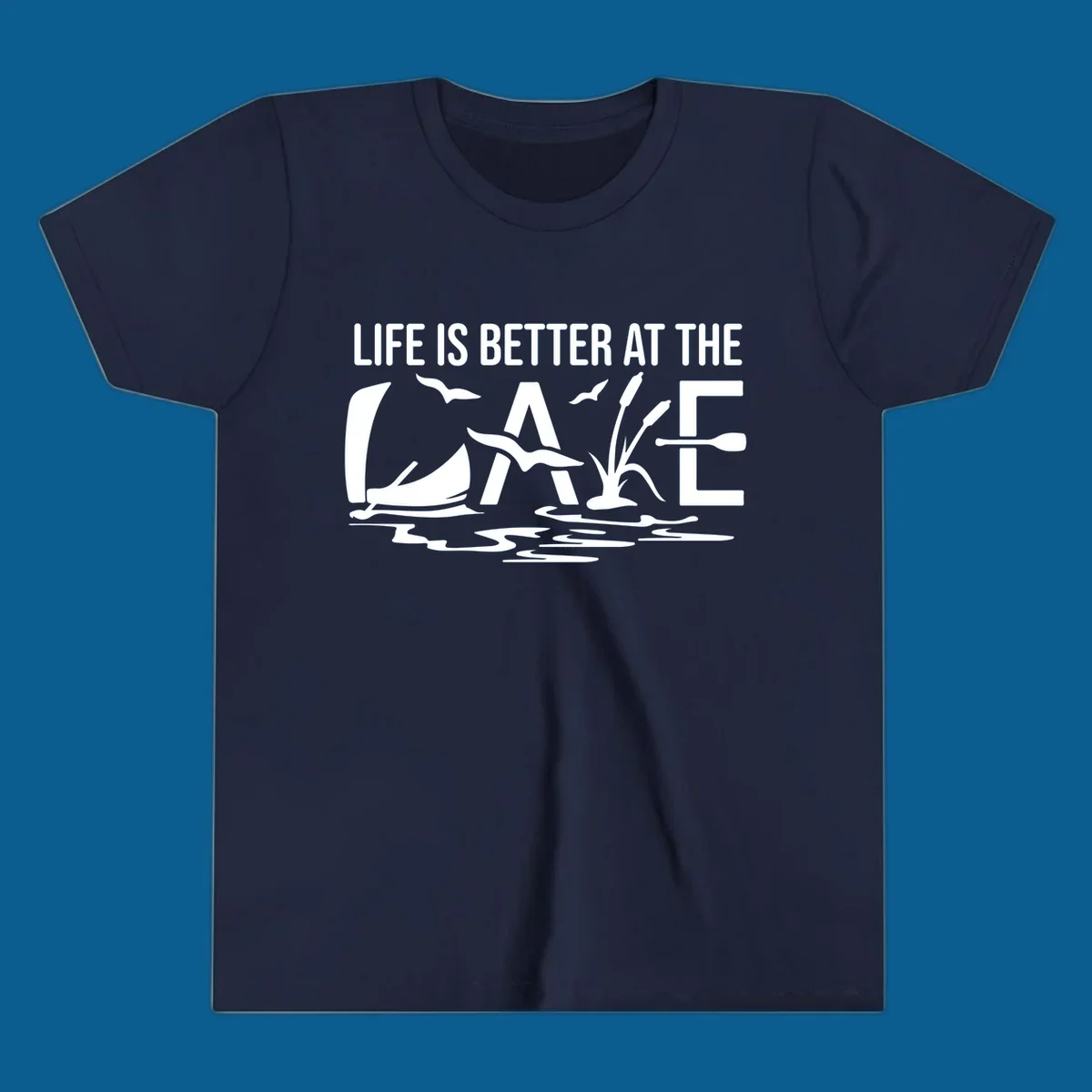 Life Is Better At The Lake design with sailboat, birds, reeds, paddle, and text.