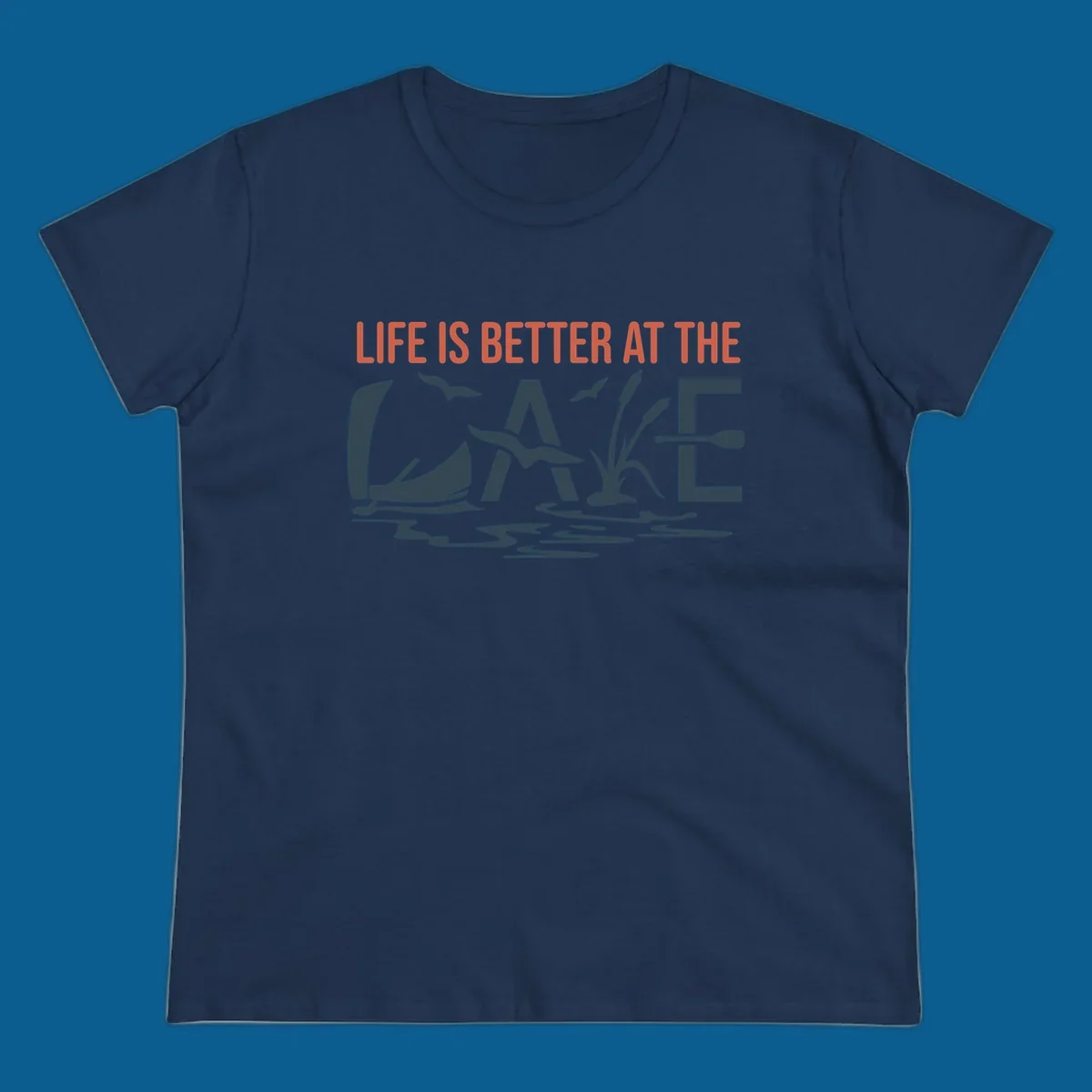 Graphic text design 'LIFE IS BETTER AT THE LAKE' with sailboat, birds, cattails, and paddle elements.