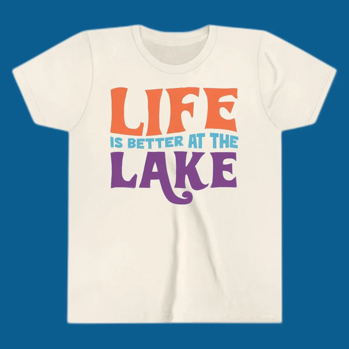 Retro typography design stating "LIFE IS BETTER AT THE LAKE" in orange, teal, and purple.
