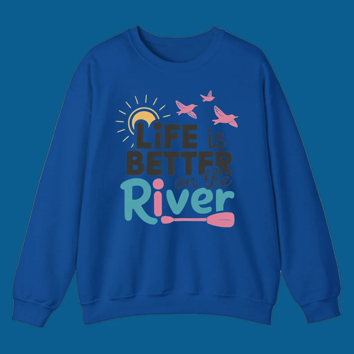 Life is better on the river quote with sun, birds, and paddle graphic.