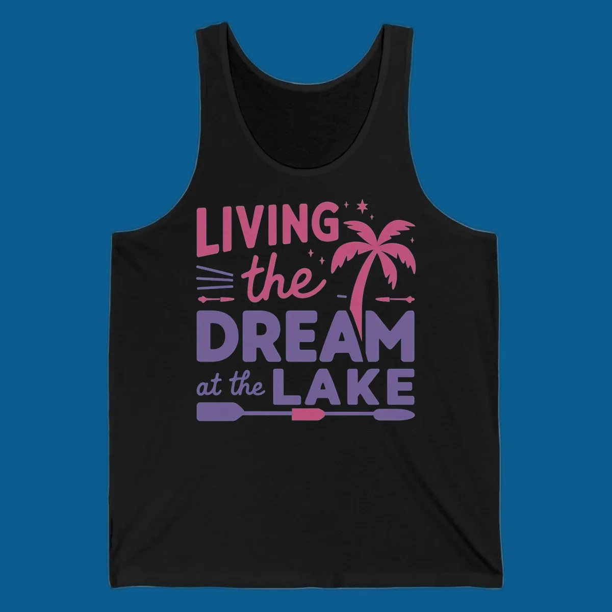 Living the dream at the lake text with palm tree and oars graphic