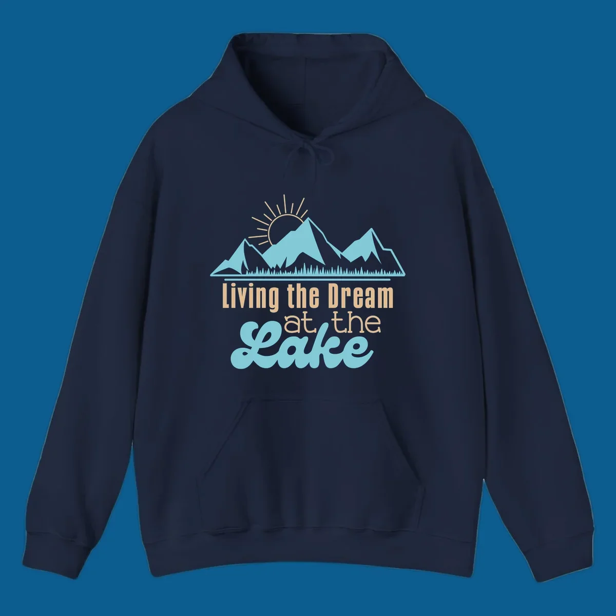 Scenic mountain range with sun and text 'Living the Dream at the Lake'.