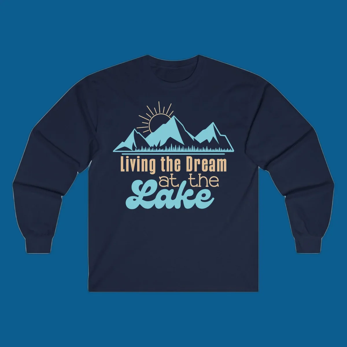 Scenic mountain range with sun and text 'Living the Dream at the Lake'.