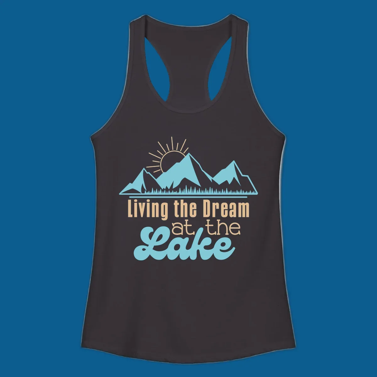 Scenic mountain range with sun and text 'Living the Dream at the Lake'.