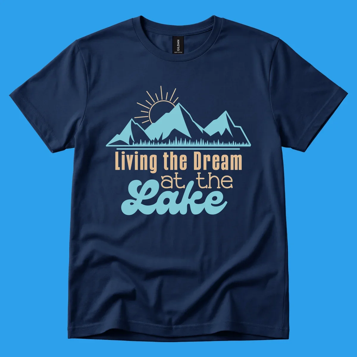 Scenic mountain range with sun and text 'Living the Dream at the Lake'.