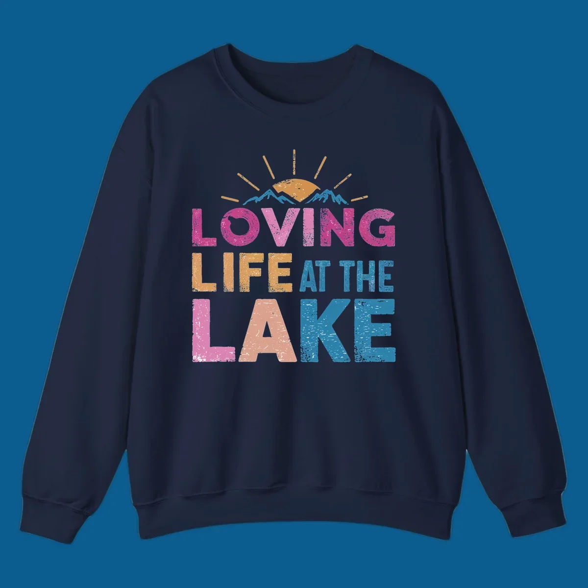 Loving Life At The Lake text with sun and mountains graphic, lake-life-appreciation