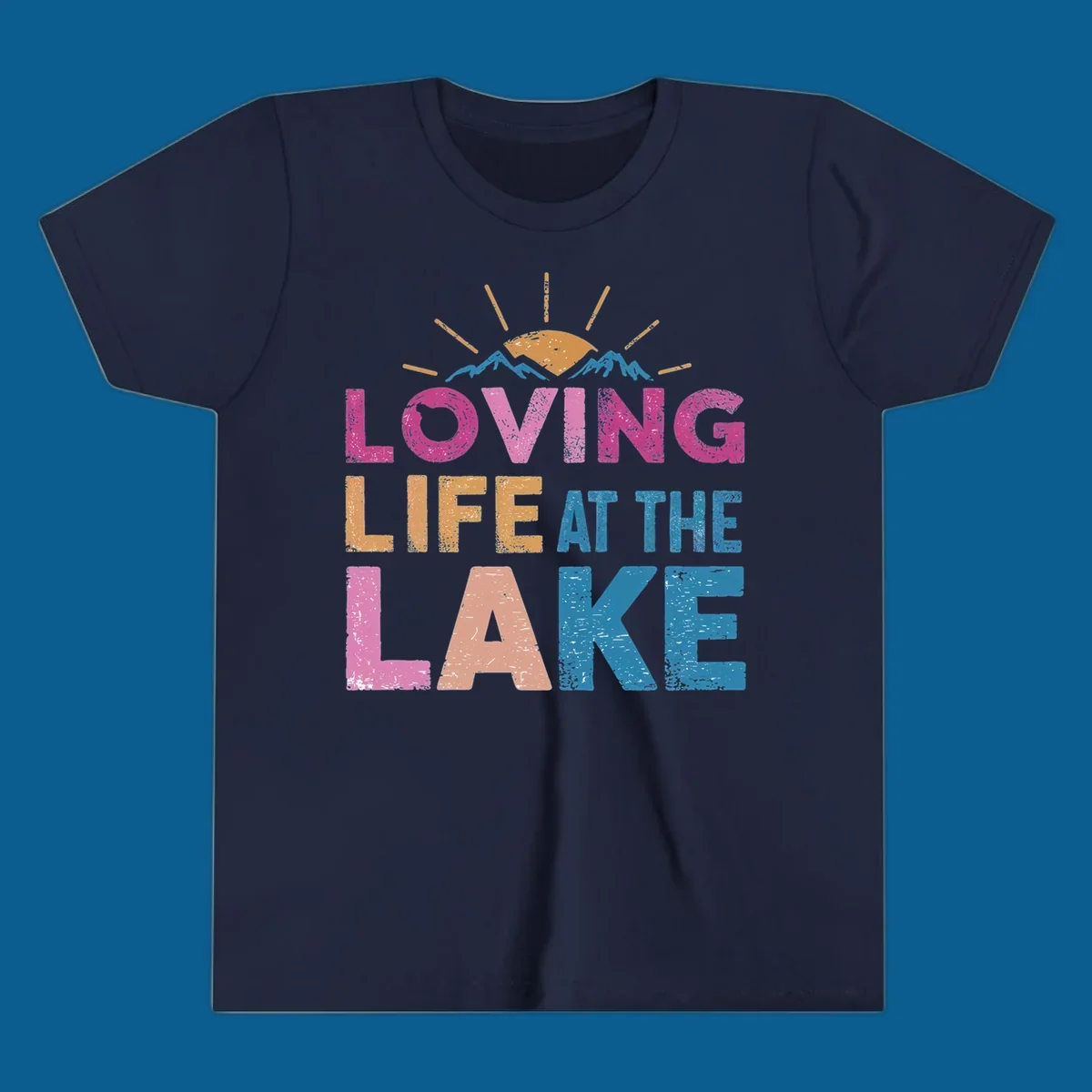 Loving Life At The Lake text with sun and mountains graphic, lake-life-appreciation