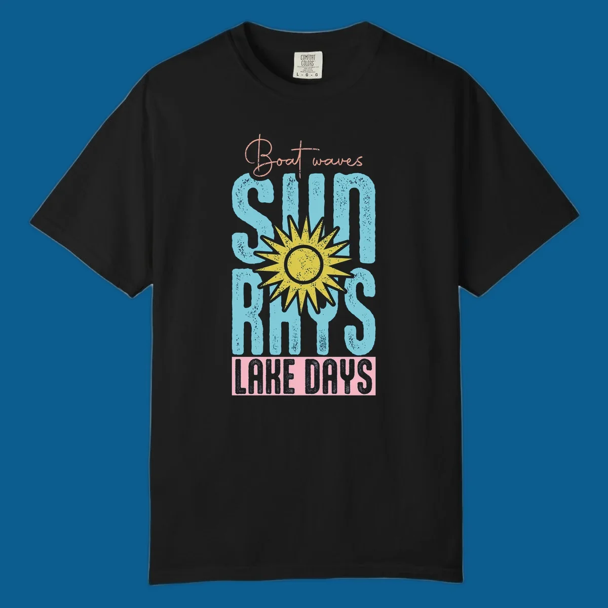 Boat waves sun rays lake days text design with a distressed sun illustration.