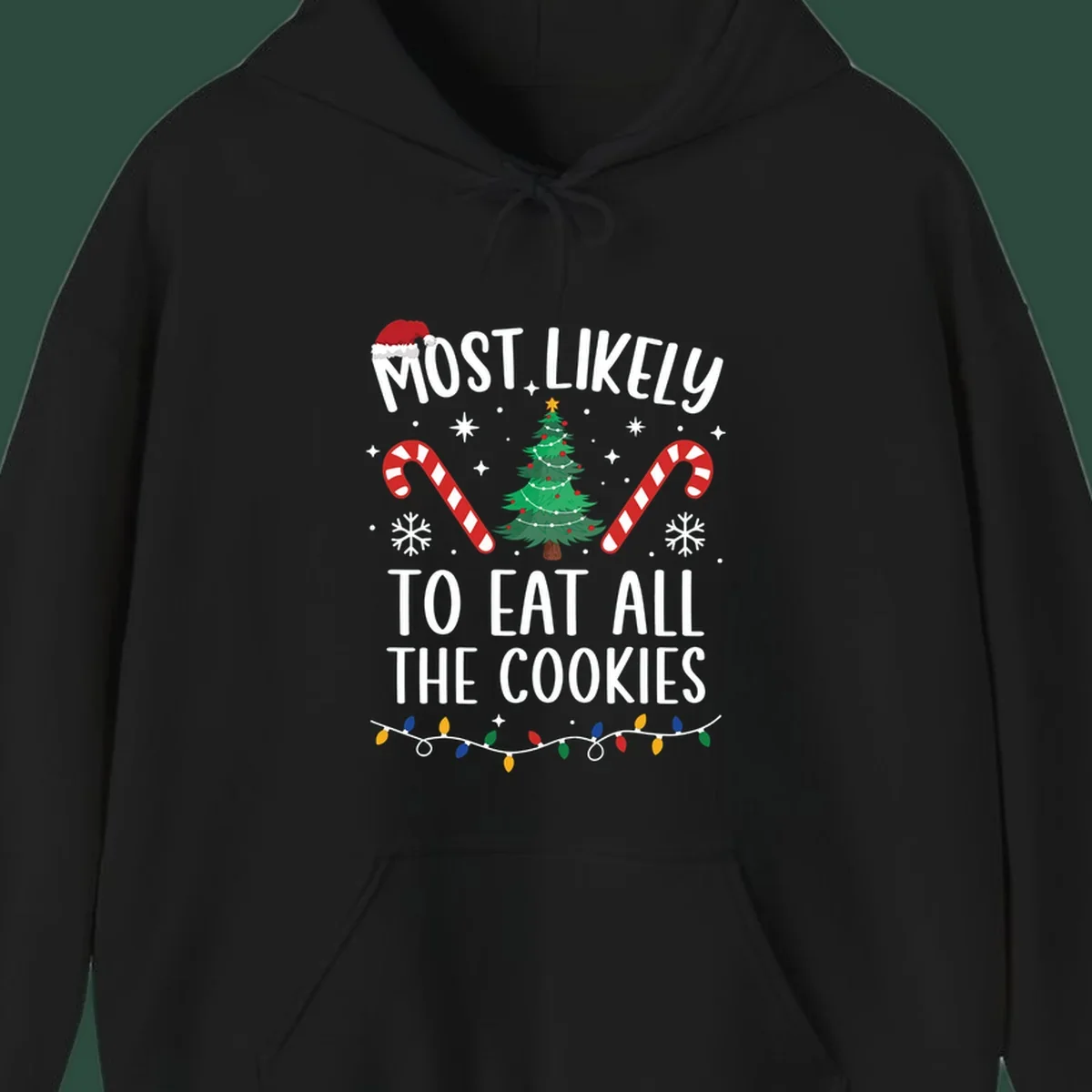 Most Likely To Eat All The Cookies Christmas graphic with tree and candy canes.