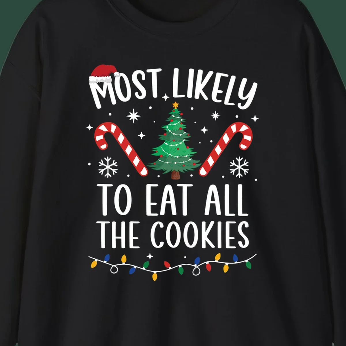 Most Likely To Eat All The Cookies Christmas graphic with tree and candy canes.