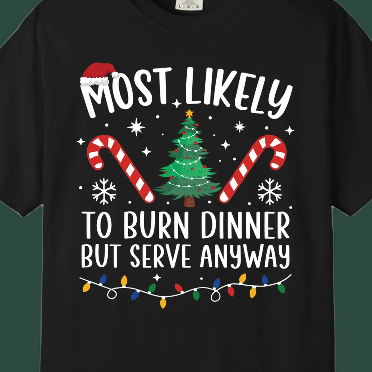 Most likely to burn dinner but serve anyway funny Christmas text with Santa hat, Christmas tree, and candy canes.