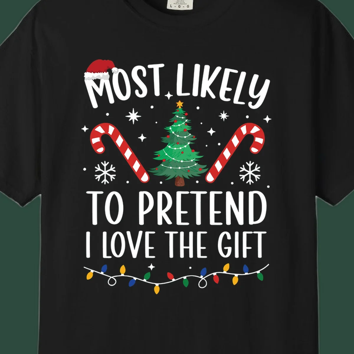 Most Likely To Pretend I Love Gift typography with Christmas elements.