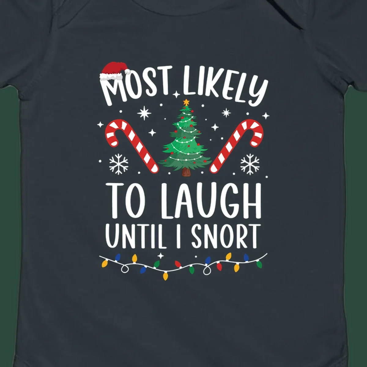 Most Likely To Laugh Until I Snort Christmas design with festive graphics.