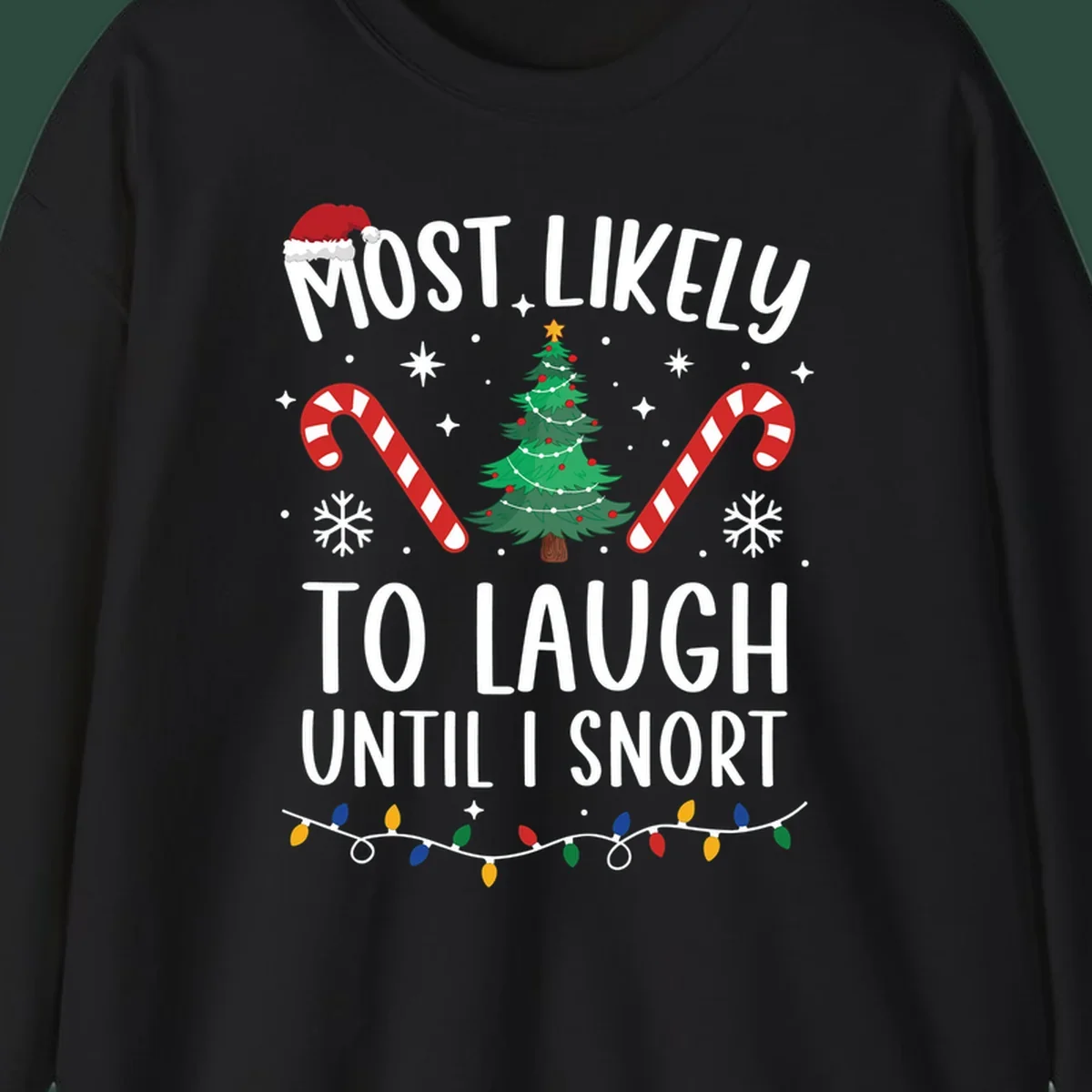 Most Likely To Laugh Until I Snort Christmas design with festive graphics.