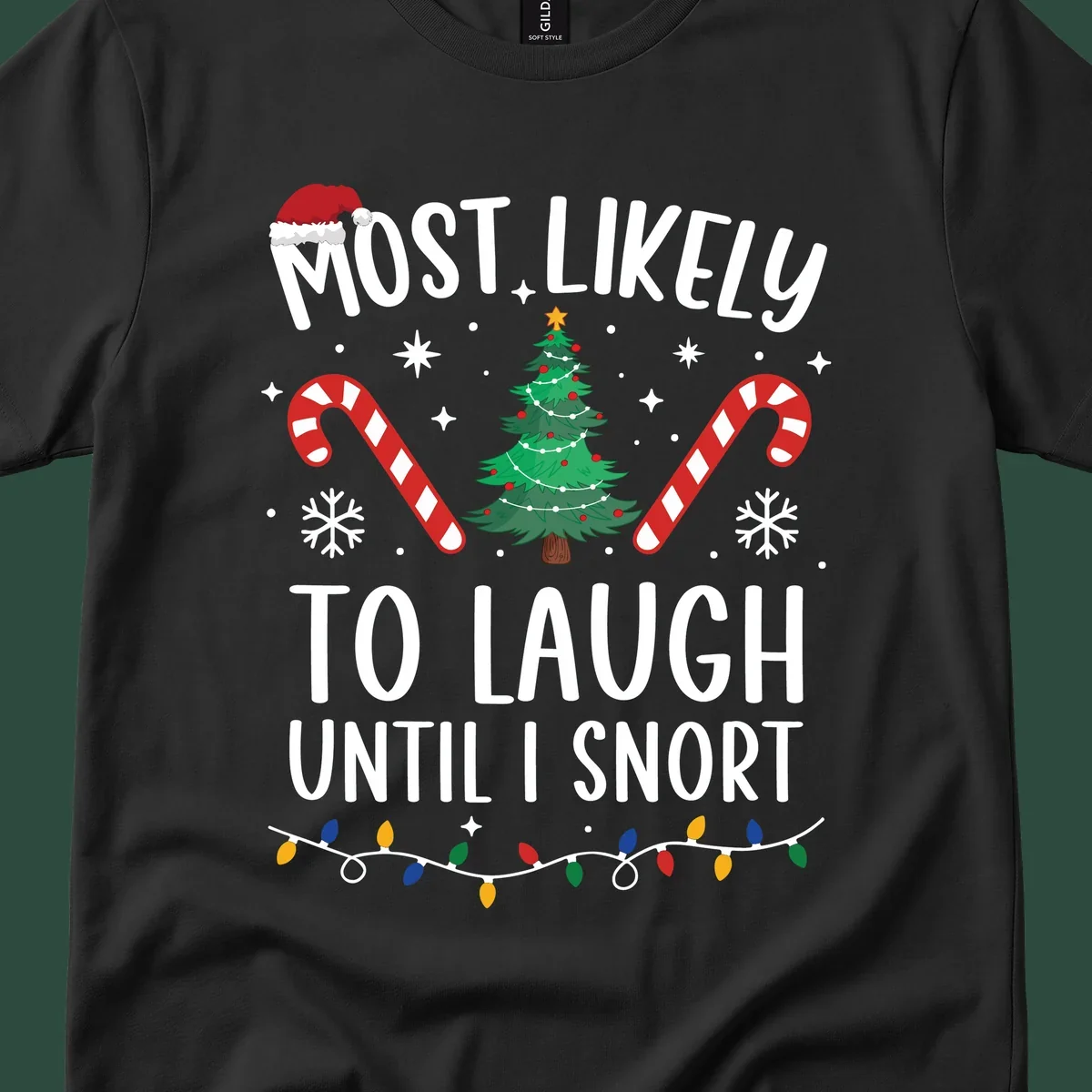 Most Likely To Laugh Until I Snort Christmas design with festive graphics.