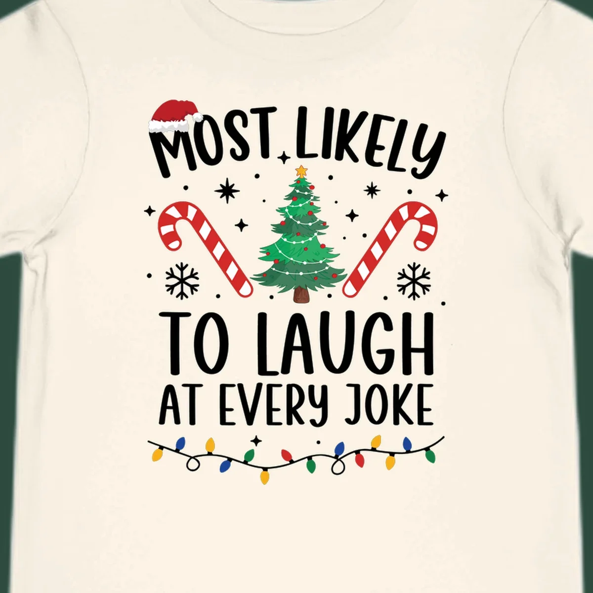 Most Likely To Laugh At Every Joke Christmas text with Santa hat, tree, candy canes, and lights.