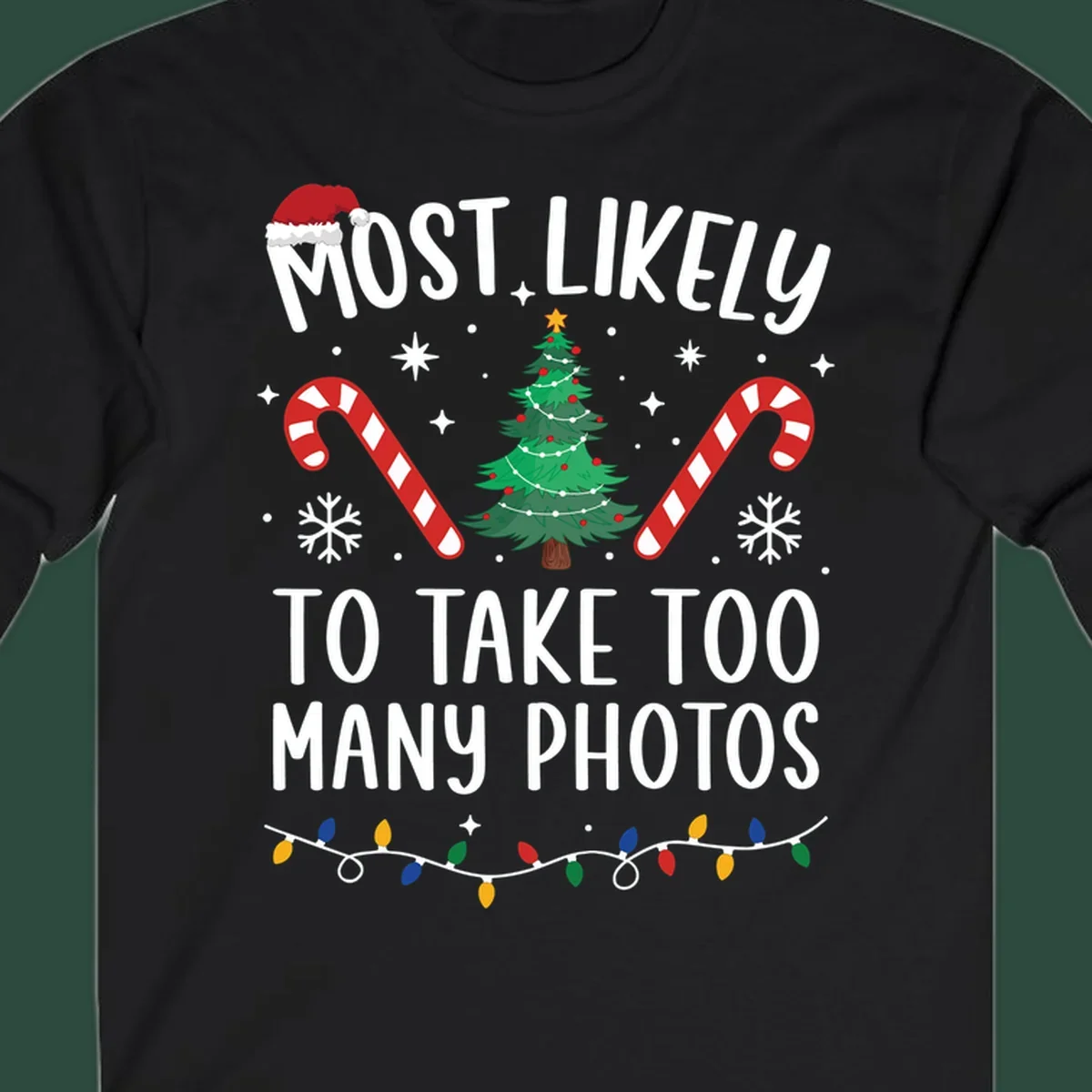 Most Likely To Take Too Many Photos Christmas design with text, candy canes, Christmas tree, and Santa hat.
