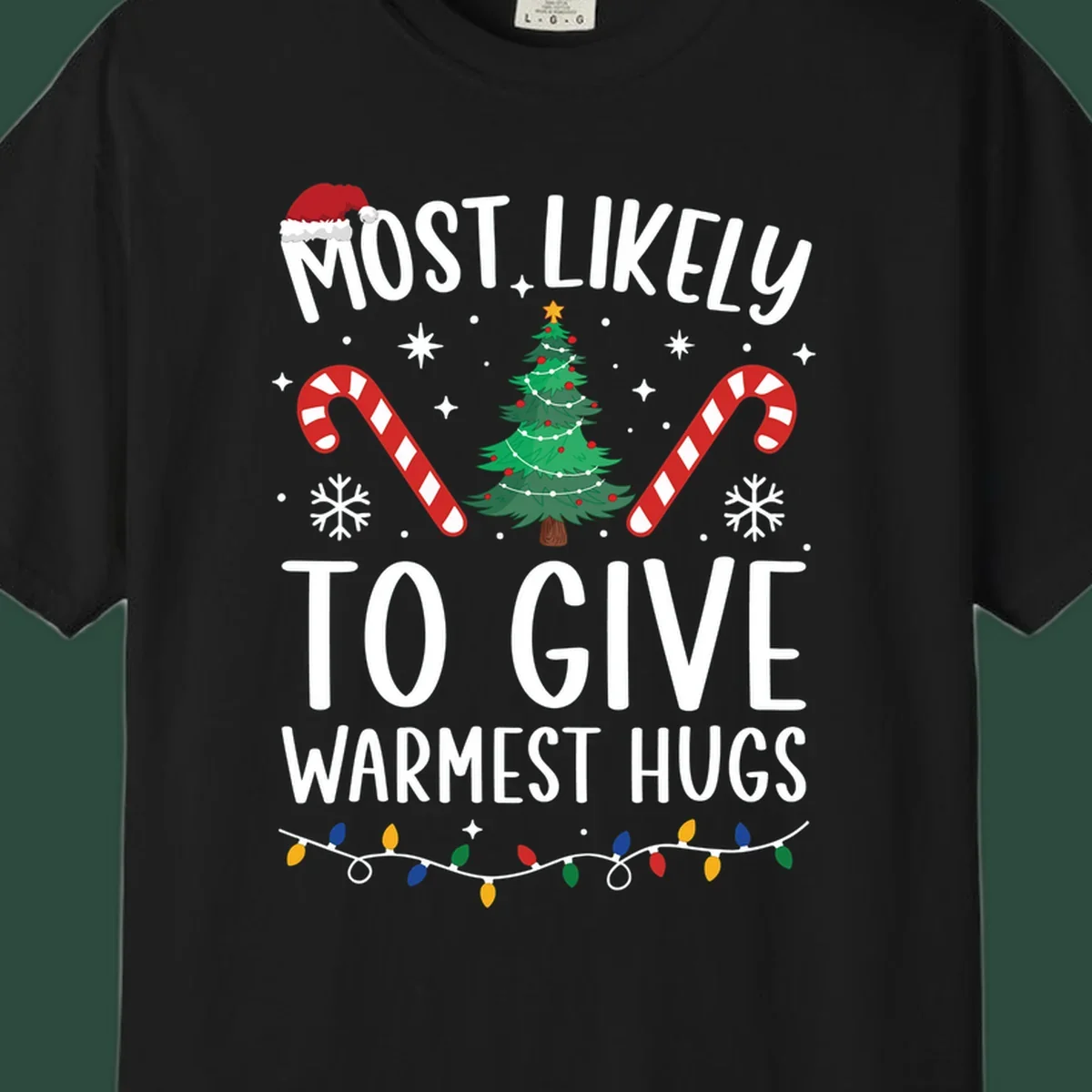 Christmas 'Most Likely To Give Warmest Hugs' design with tree, candy canes, and lights.